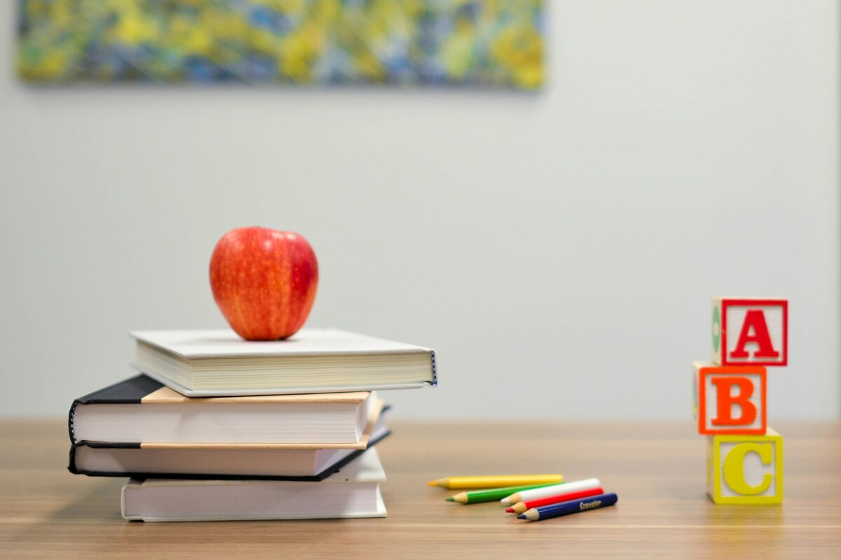 fruit on a pile of books